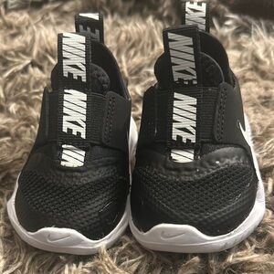 Nike Black and White Sneakers with Slip-On Design and Breathable Material